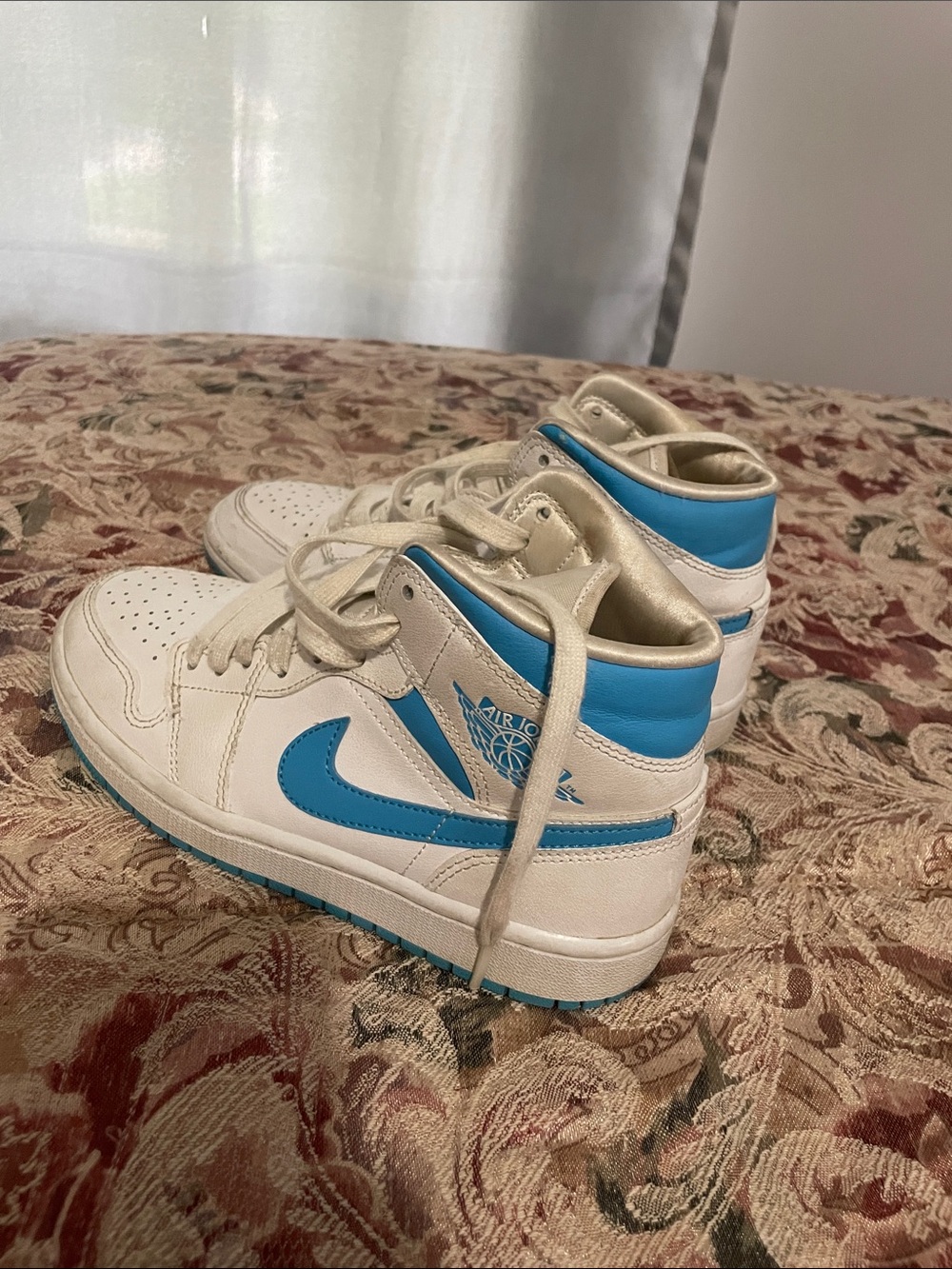 Jordan Women's High-Top Sneakers in White and Blue